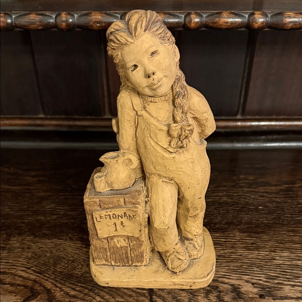 Charming Tan Girl with Lemonade Stand Sculpture